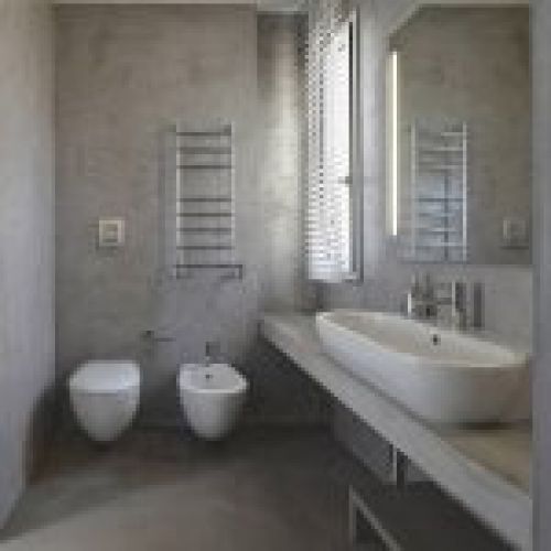 Baño con acabado en microcemento