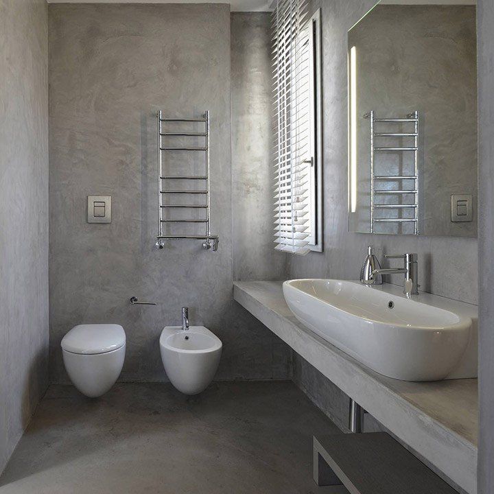 Baño con acabado en microcemento
